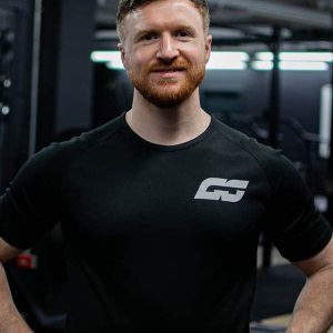 GS The Movement Coach smiling, welcoming you to the 28 Day Challenge.